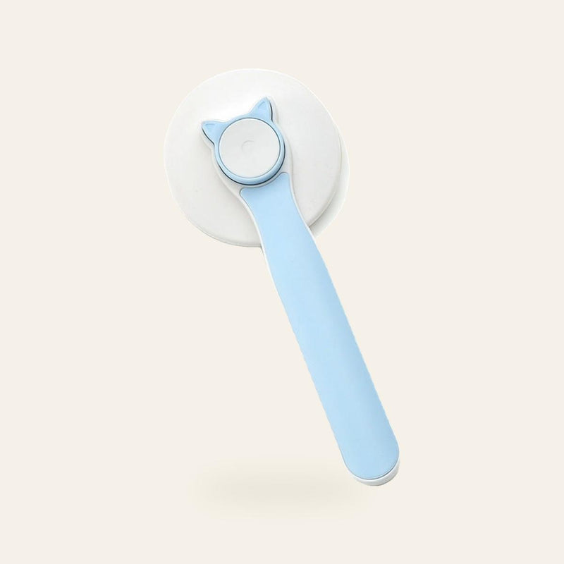 FURVIA Self-Cleaning Slicker Brush on a cream background