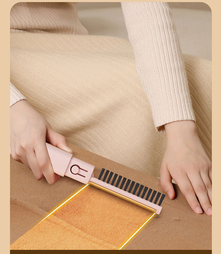 The detachable comb being used along a fabric surface.